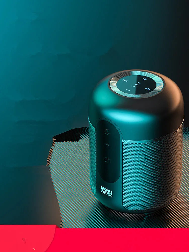 Black portable Bluetooth speaker showing front grille and control buttons