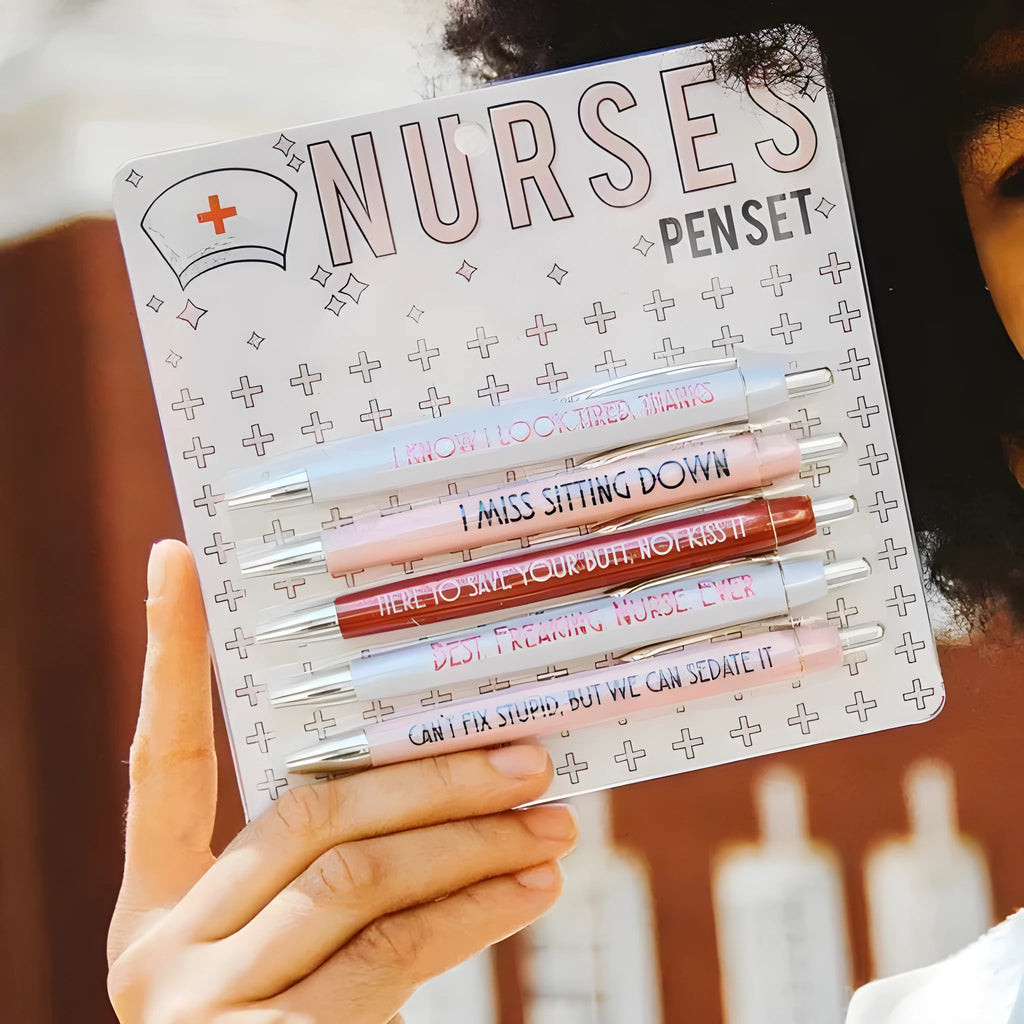 Set of five blue and white nurse-themed retractable ballpoint pens.