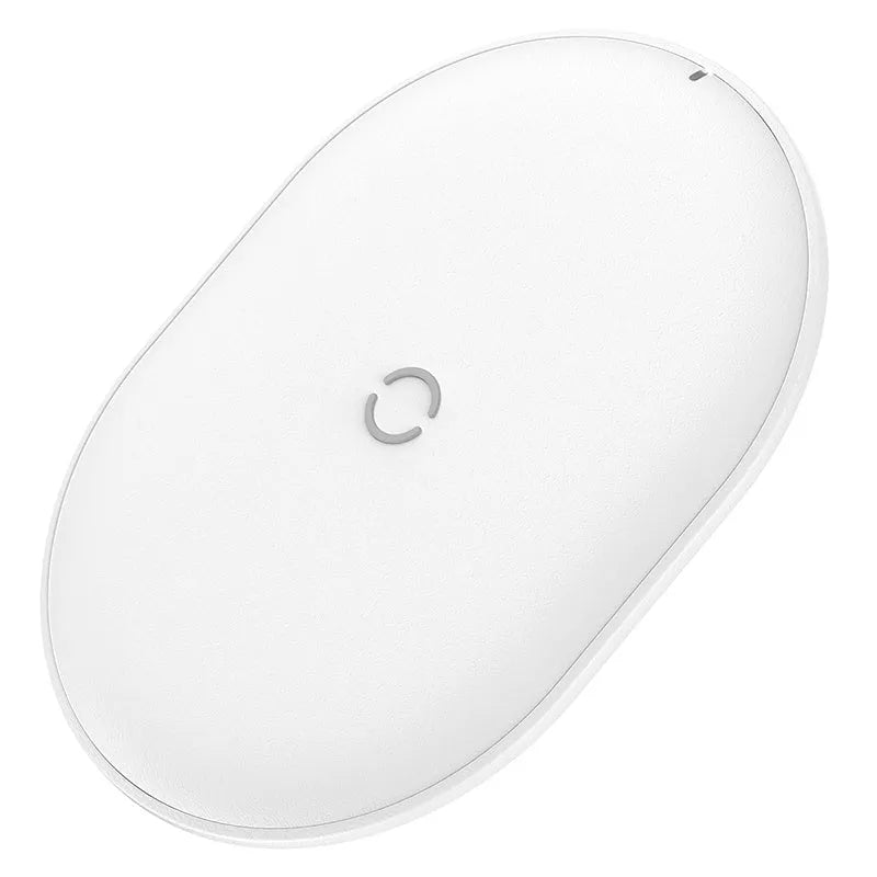Black Baseus wireless charging pad with a textured surface and a small LED light, next to a mobile phone.