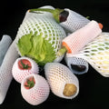 White foam net shockproof protective case for fruit, shown with sizing options.