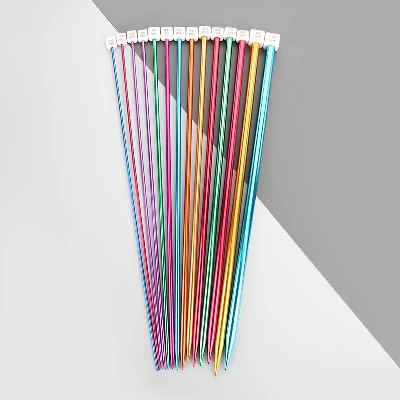 Set of long-handle metal crochet hooks with protective end caps arranged by size