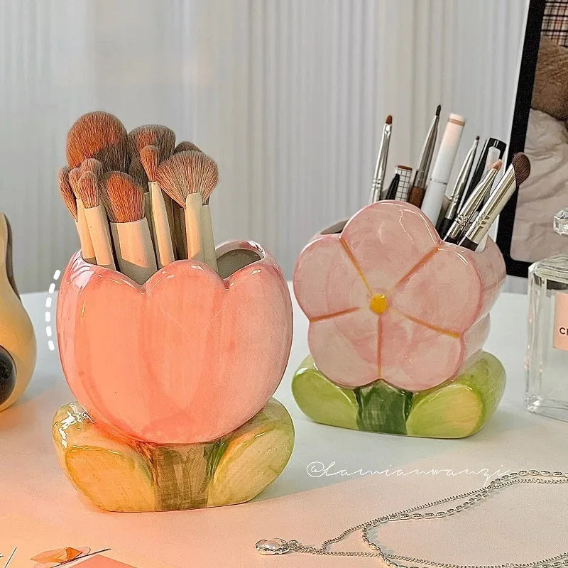Ceramic flower pen holder storage box in floral pattern colours on desktop