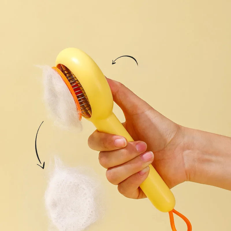 Small yellow duck comb for pet grooming with needle brush construction