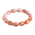 Natural cherry blossom coloured agate barrel bead bracelet with a Ruyi charm.