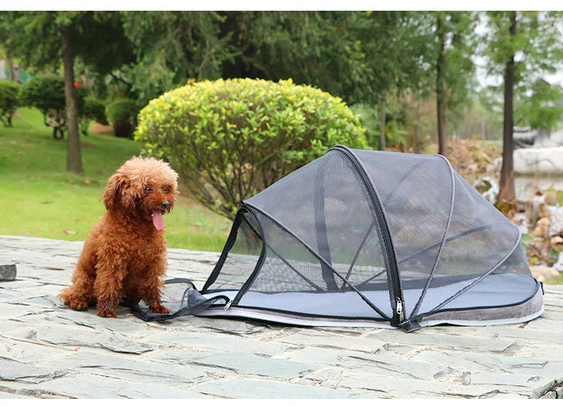Blue half mesh folding pet tent for cats, shown in a collapsed and portable state.