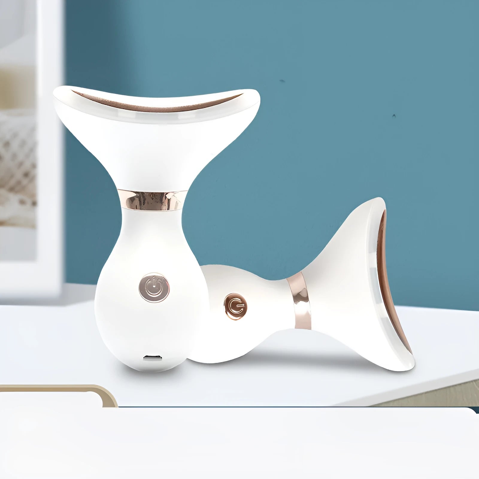 Portable USB rechargeable beauty instrument with white casing and metal light head for neck wrinkle removal