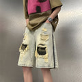 Men's yellow mud camouflage denim shorts with distressed detailing and straight-leg Korean styling