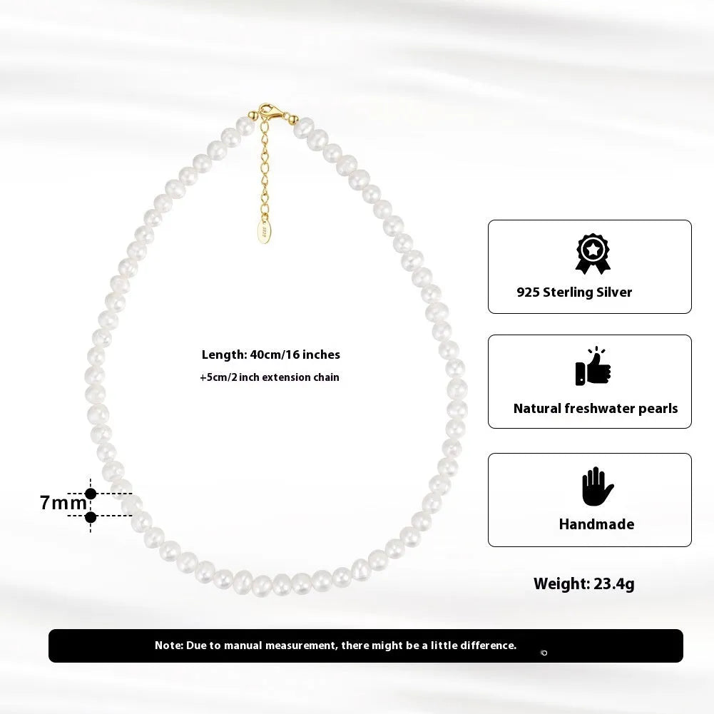 Silver adjustable necklace with freshwater pearl pendant on display