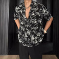 Printed floral short sleeve shirt in loose casual pendant style available in white and black colours