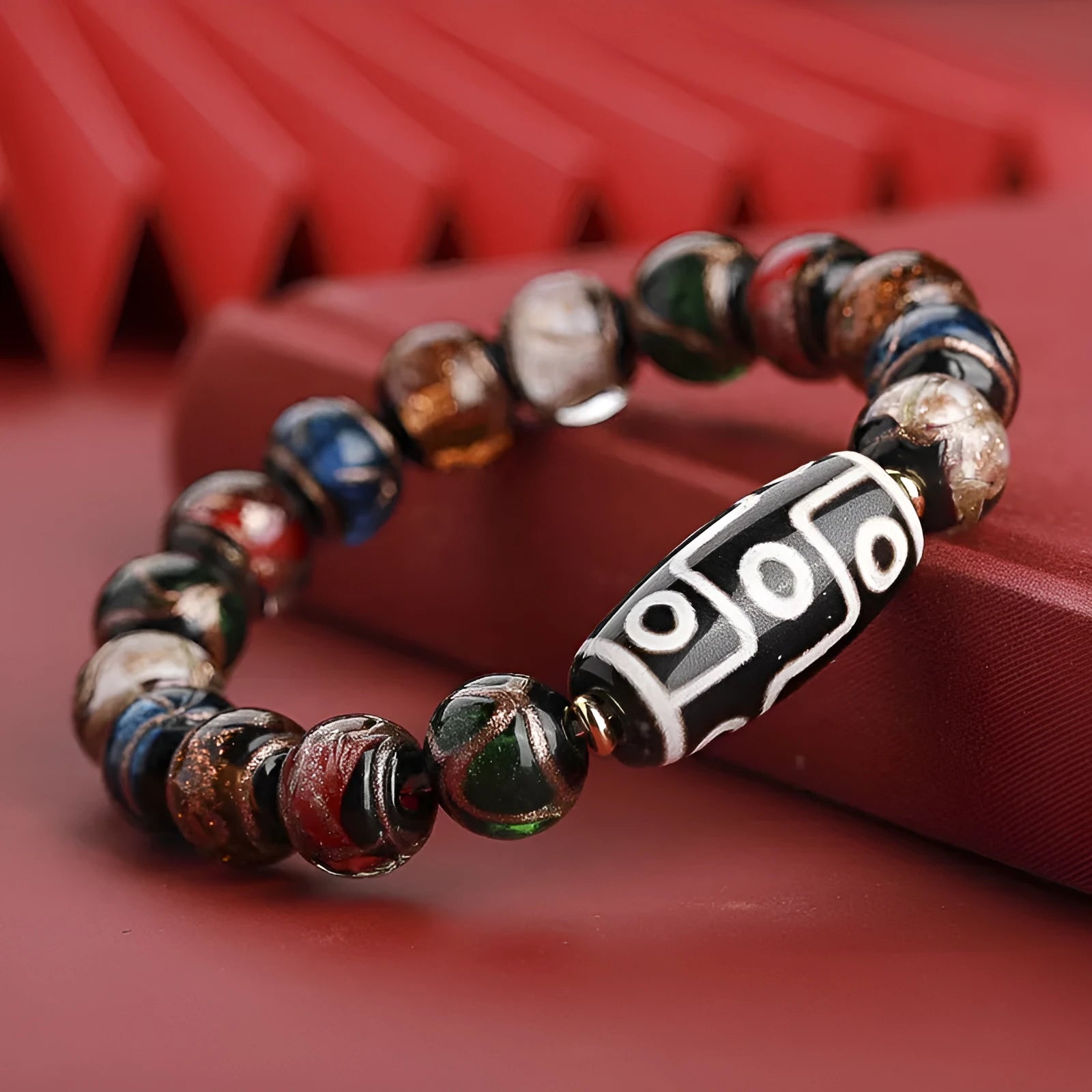 Handmade coloured glaze bracelet with auspicious patterns and year snake motif in Chinese style