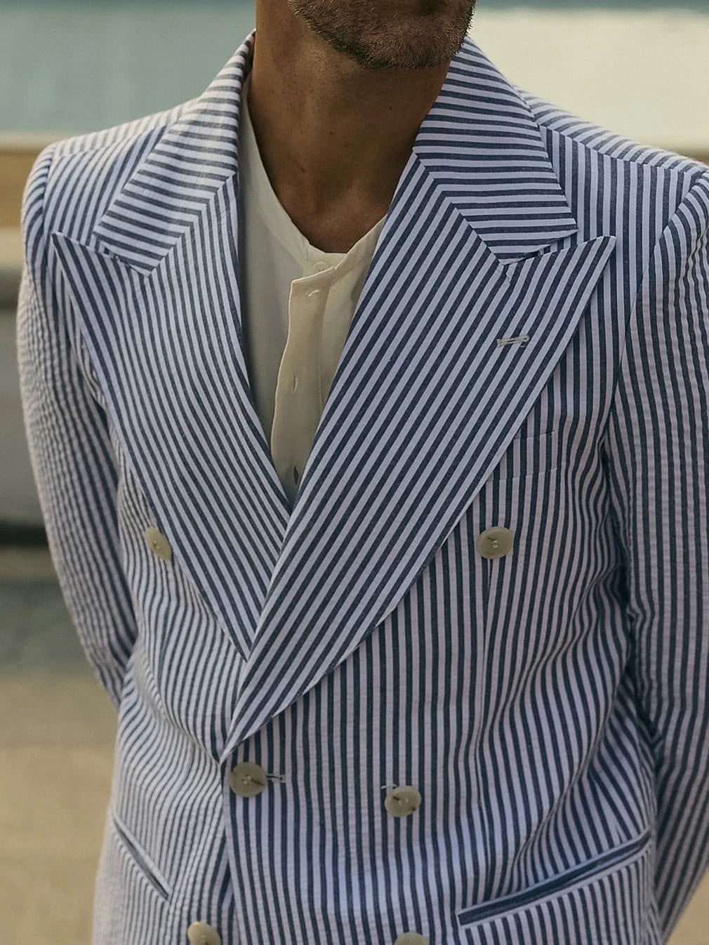 Blue and white striped polyester suit set with blazer and trousers for men