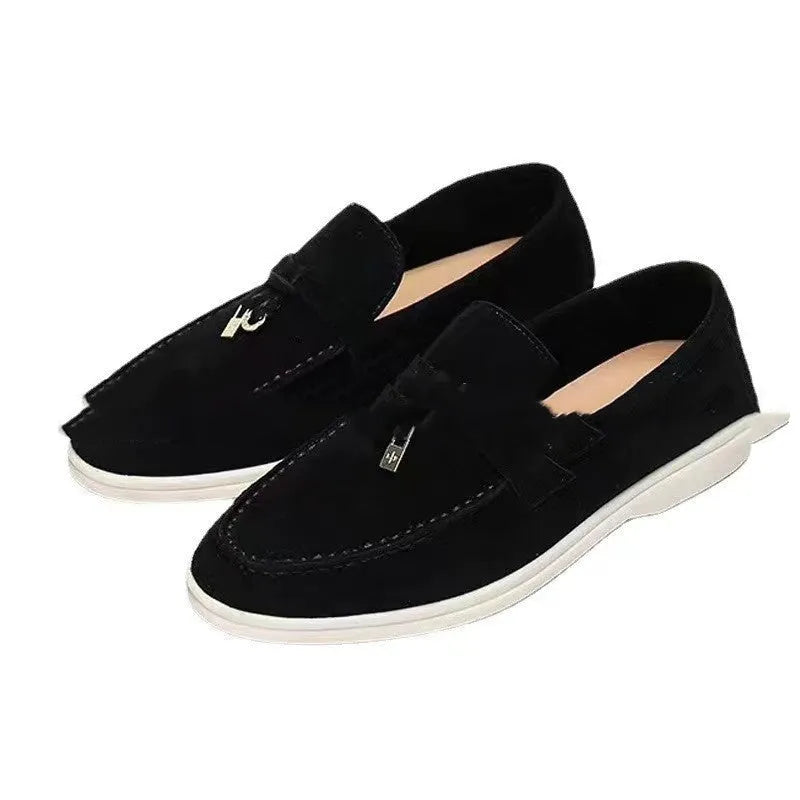 Gommino slip-on loafers with high-top design, round toe with steel head, and sewing line detail on artificial PU upper