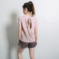 Women's short sleeve sports T-shirt in pink colour for yoga and running activities