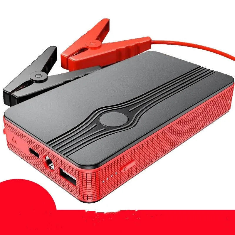 Red K4-E automobile emergency starting power supply unit with data cable, showing compact dimensions