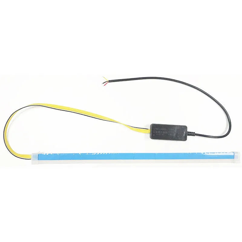Slim silicone car LED daytime running light strip with flowing turn signal effect on a vehicle headlight.