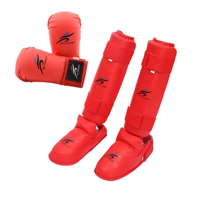 Complete martial arts protective gear set with red leg guards, helmet and boxing gloves