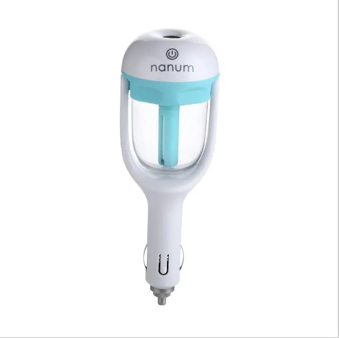 Compact blue car humidifier with essential oil diffuser function on car dashboard