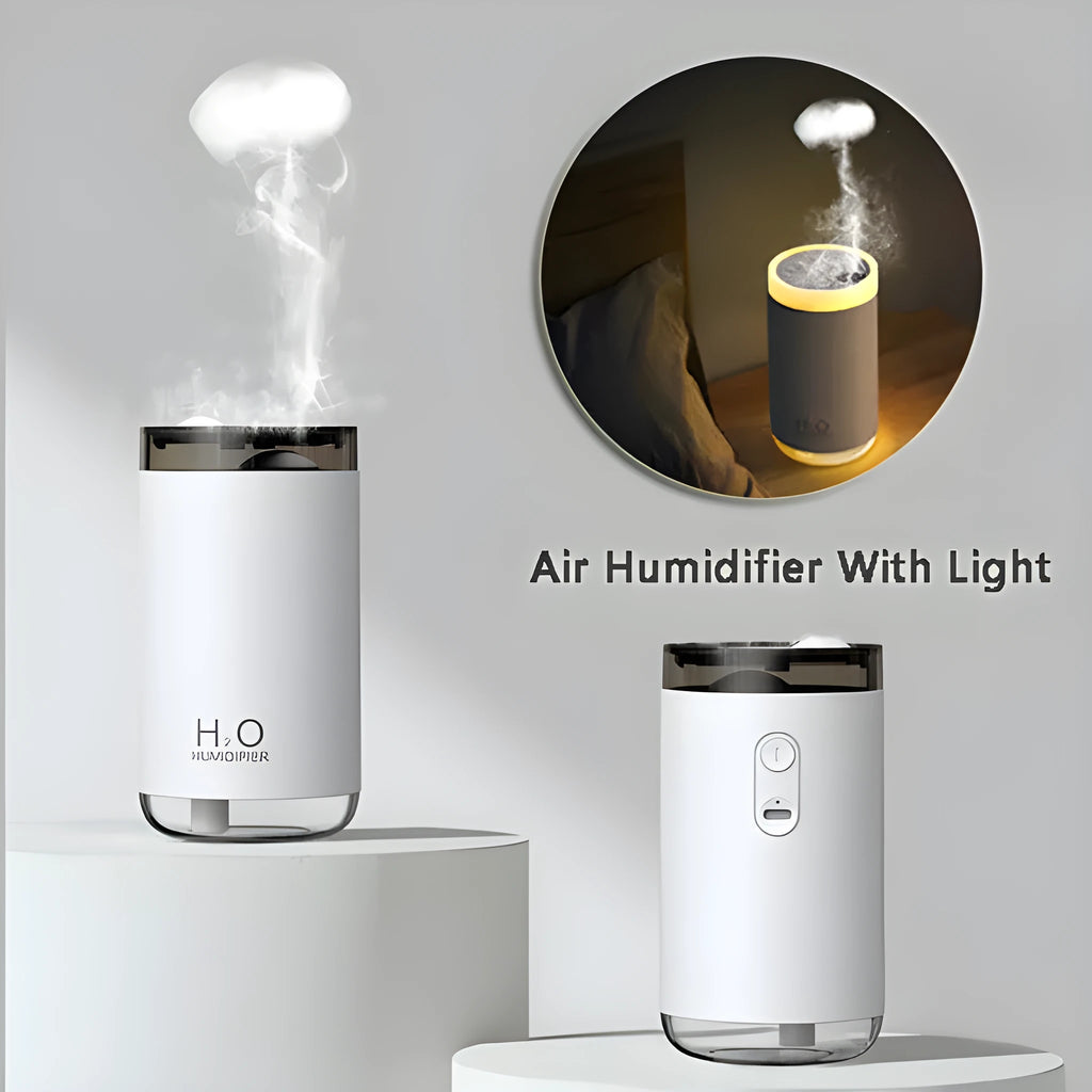 Mini USB jellyfish humidifier with warm night light in white, showing smoke-ring mist output