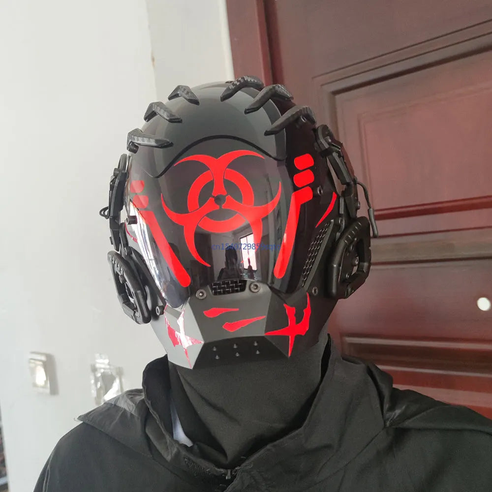 Black cyborg-style full face prop mask helmet with bioweapon design on a white background.