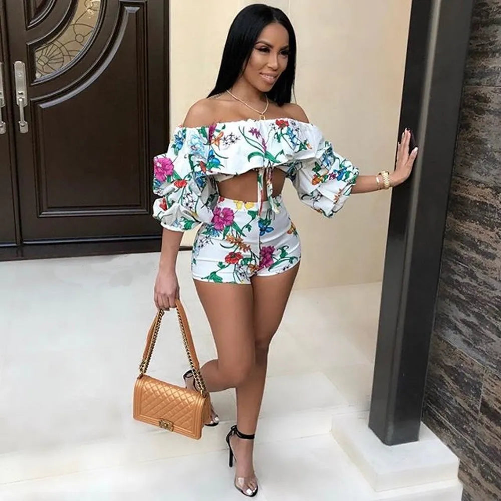 Women's multicolour digital print two-piece set with textured pile sleeves on the top and matching shorts.