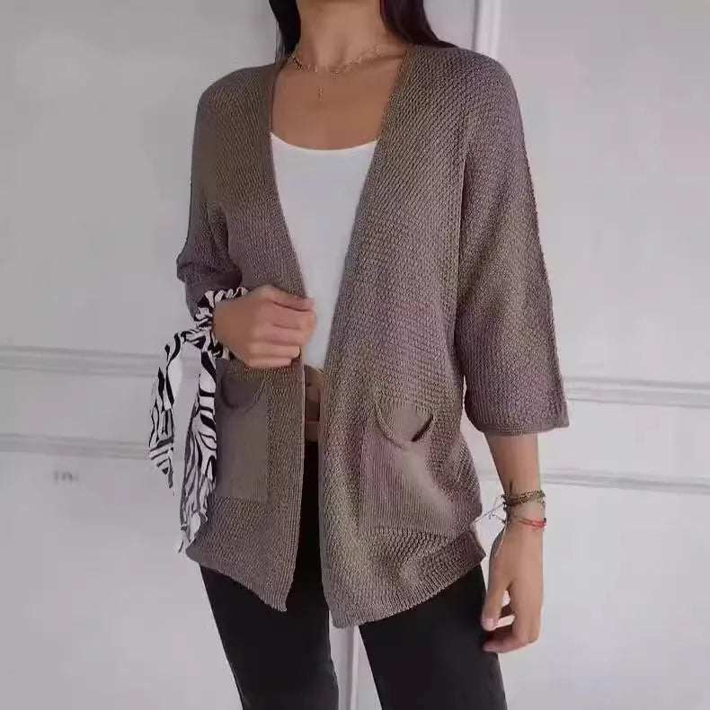 Women's waffle pattern cardigan coat in army green with nine-quarter sleeves and pocket details