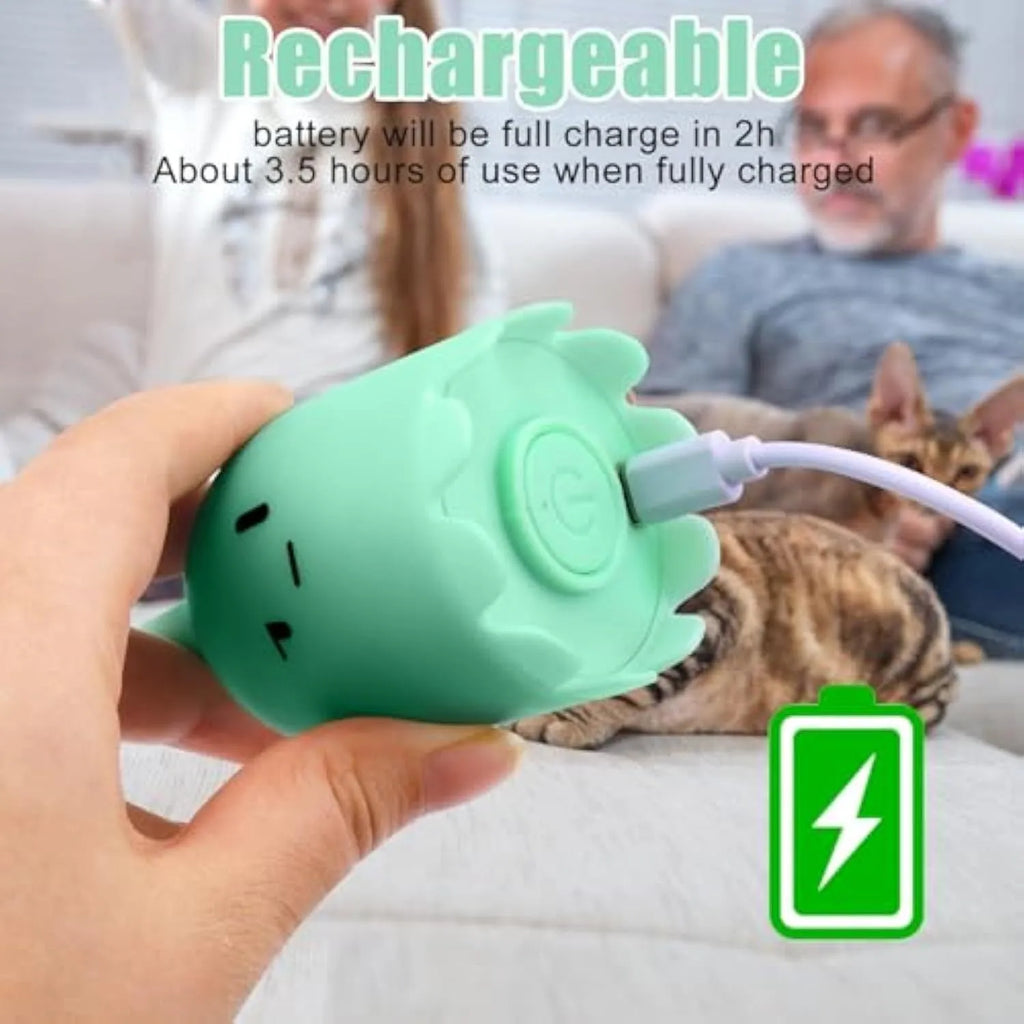 Rechargeable automatic cat toy with motorised swinging silicone tail on green background