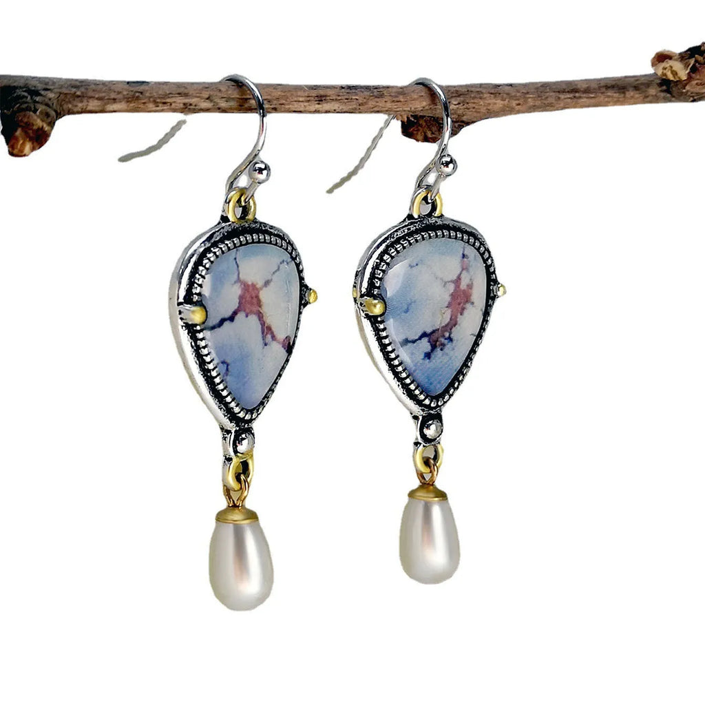 Retro blue geometric drop earrings with synthetic opal and pearl accents on metal
