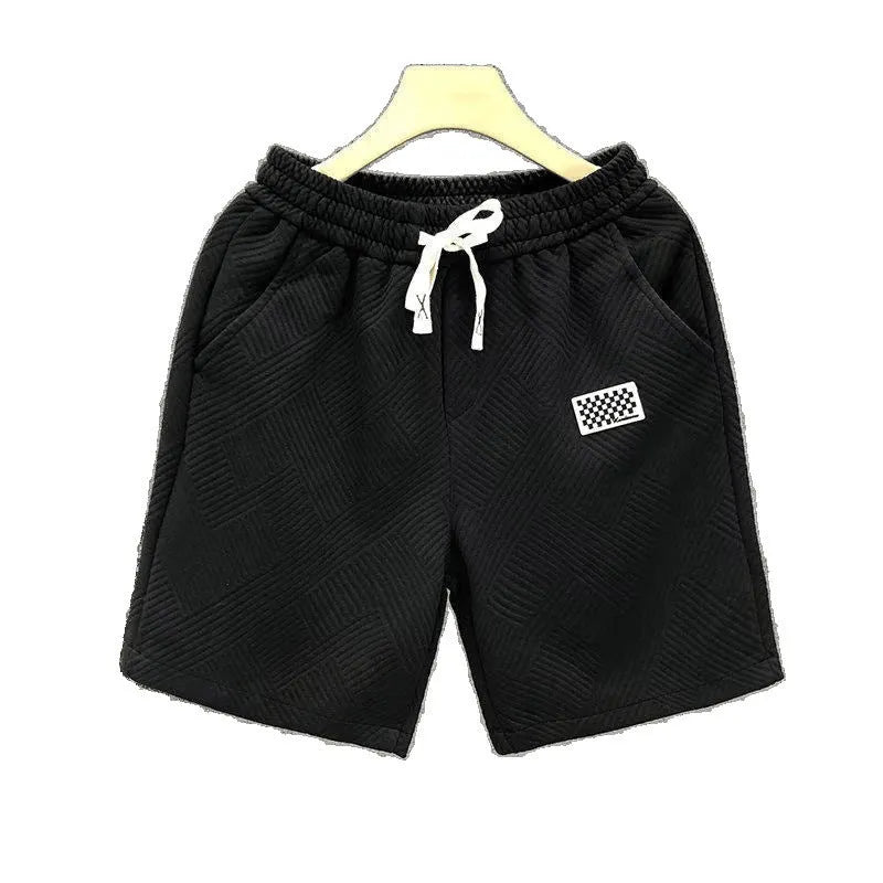 Men's solid colour polyester sports shorts in black, shown in an American casual style fit.