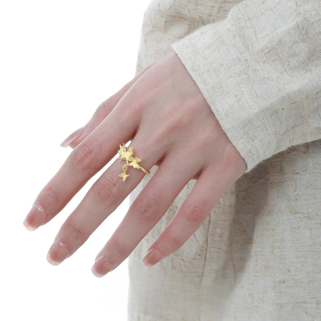 Adjustable silver ring with wild butterfly design in electroplated gold colour