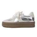 Retro beige and silver sports shoes with cross straps and round toe