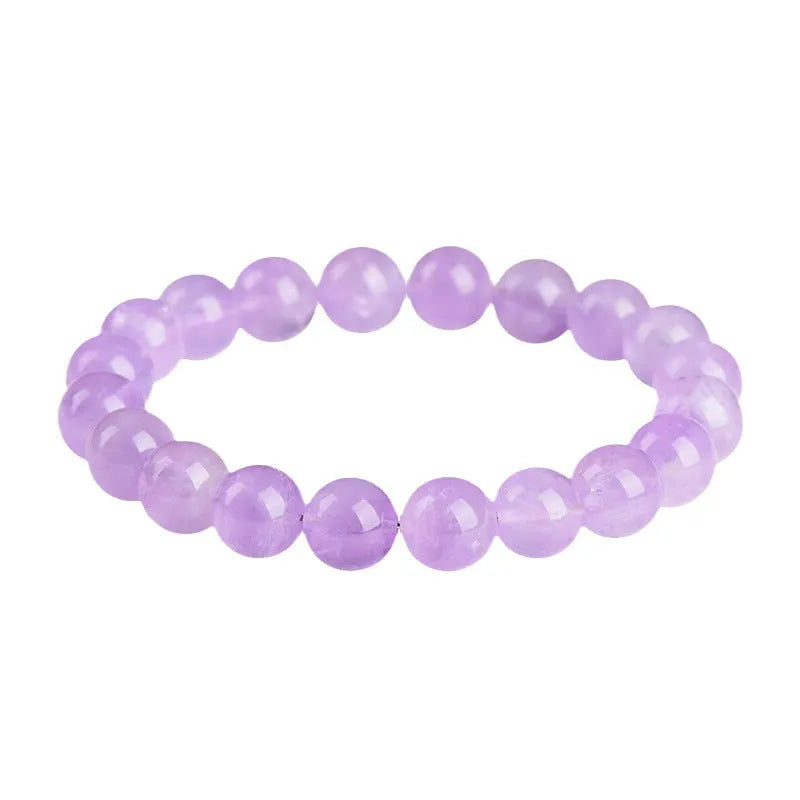 Lavender amethyst crystal bracelet with geometric round beads showing water ripple pattern