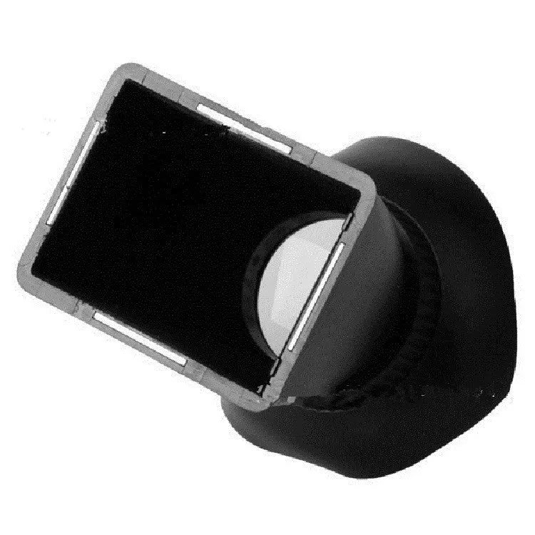 Camera framing amplifier with magnetic mount attached to DSLR LCD screen showing 2.8x magnification