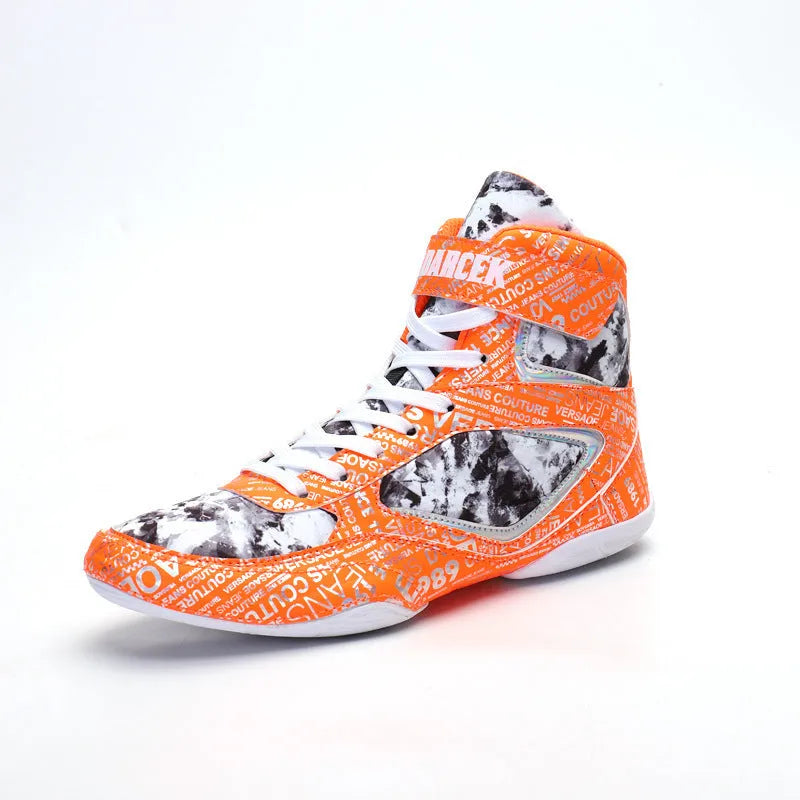 Men's high-top boxing shoes with graffiti style, black colour, front lace-up closure, mesh upper, and rubber outsole on a flat surface.