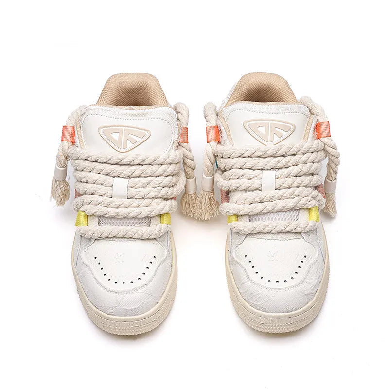 Creamy white retro skate shoes with old damage lace design and low-top platform construction