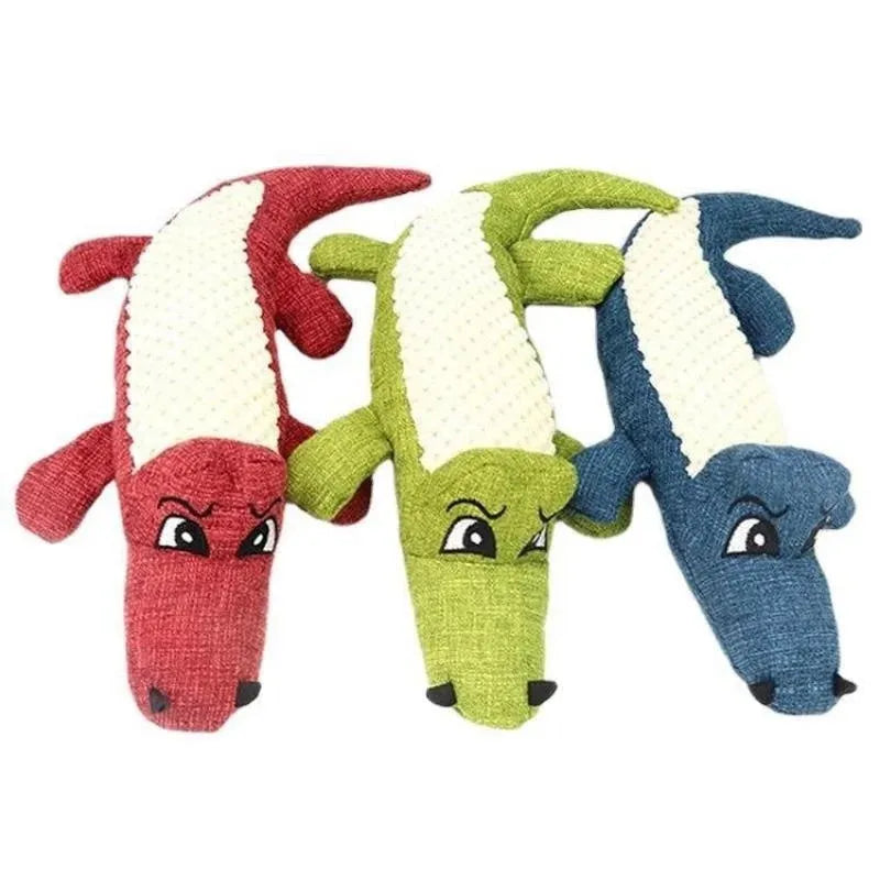 Blue, green, and red pet plush toys with a corn grid design for biting sound.