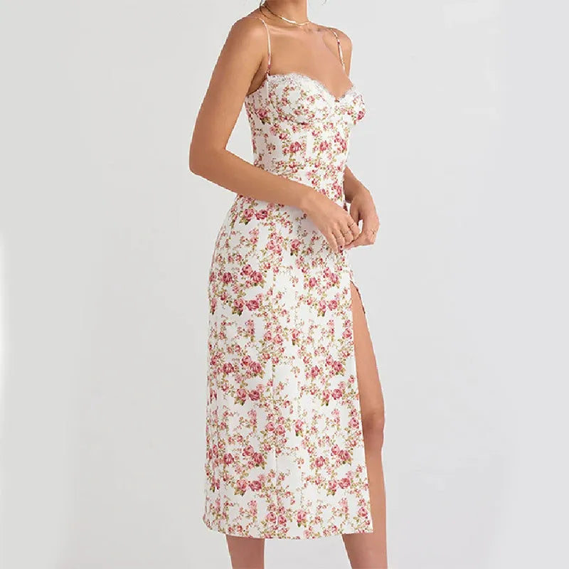 Blue lace flowers print long dress on a mannequin, showing side slit and suspender straps.