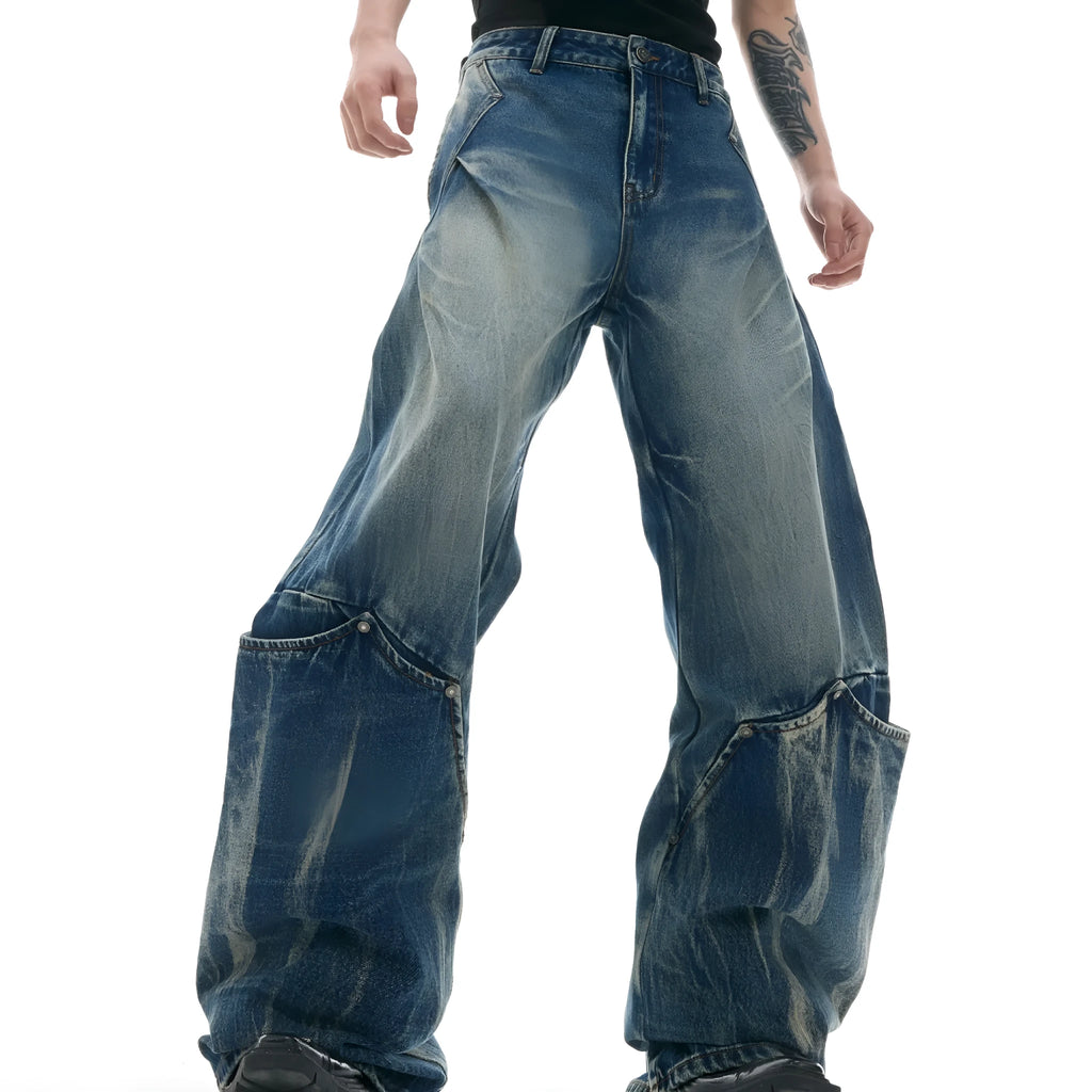 Men's verdant blue jeans with retro washed burst pattern and curved knife style loose fit design