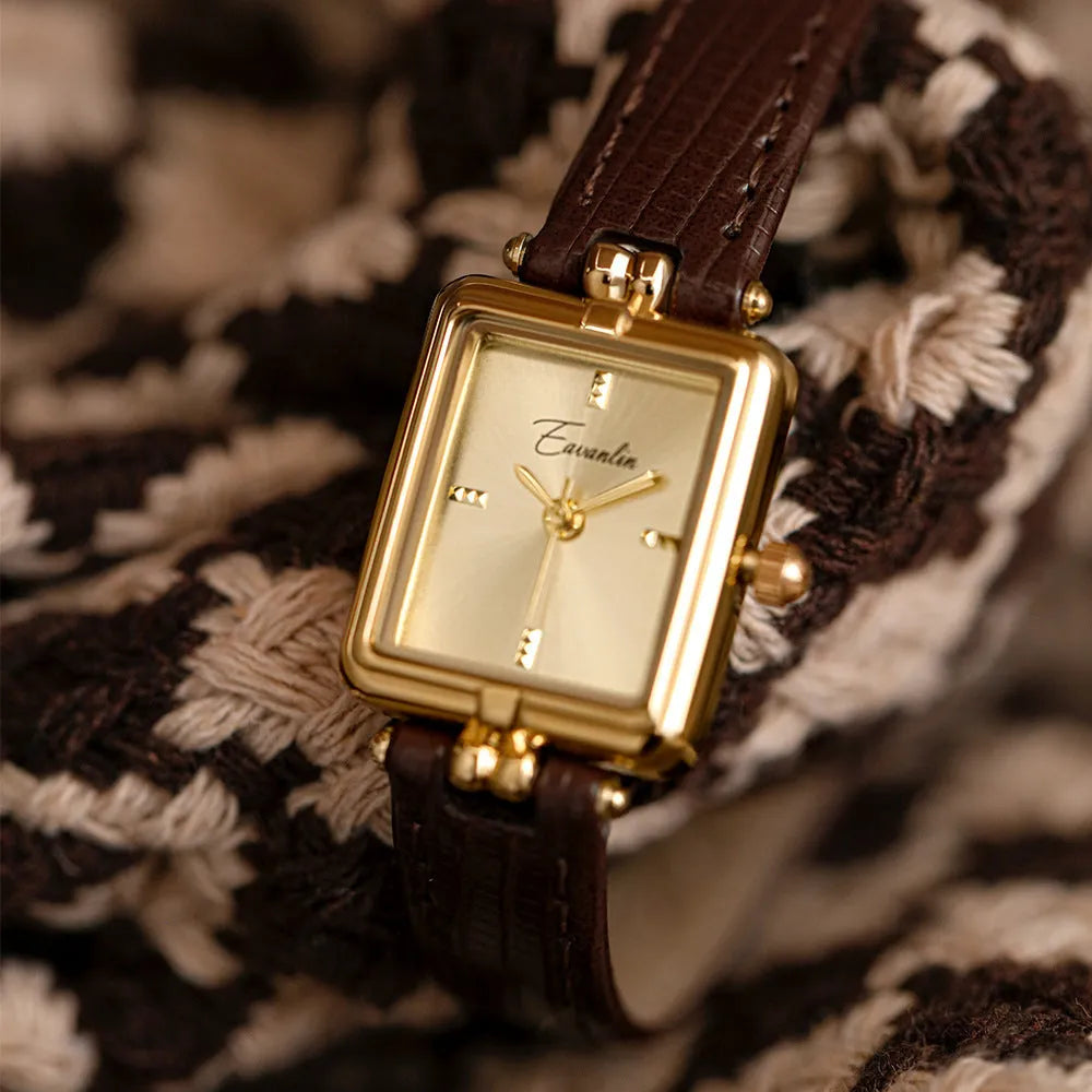 Women's retro special interest light luxury small square watch with black leather strap and gold frame