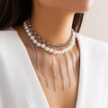 Double-layer retro necklace with imitation pearls, geometric iron pendant, tassel chain, and ball bead chain in White K finish