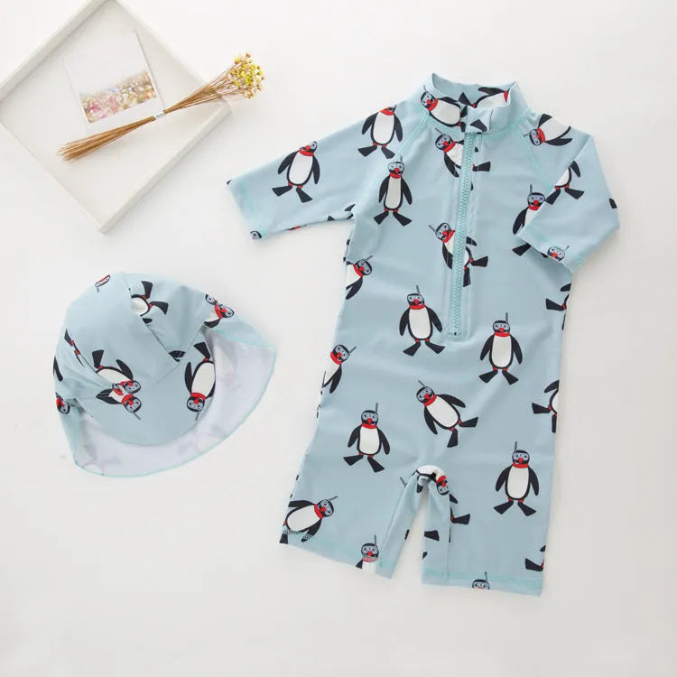 Boys' penguin print one-piece swimsuit with long sleeves and matching swimming cap for children aged 2-7 years