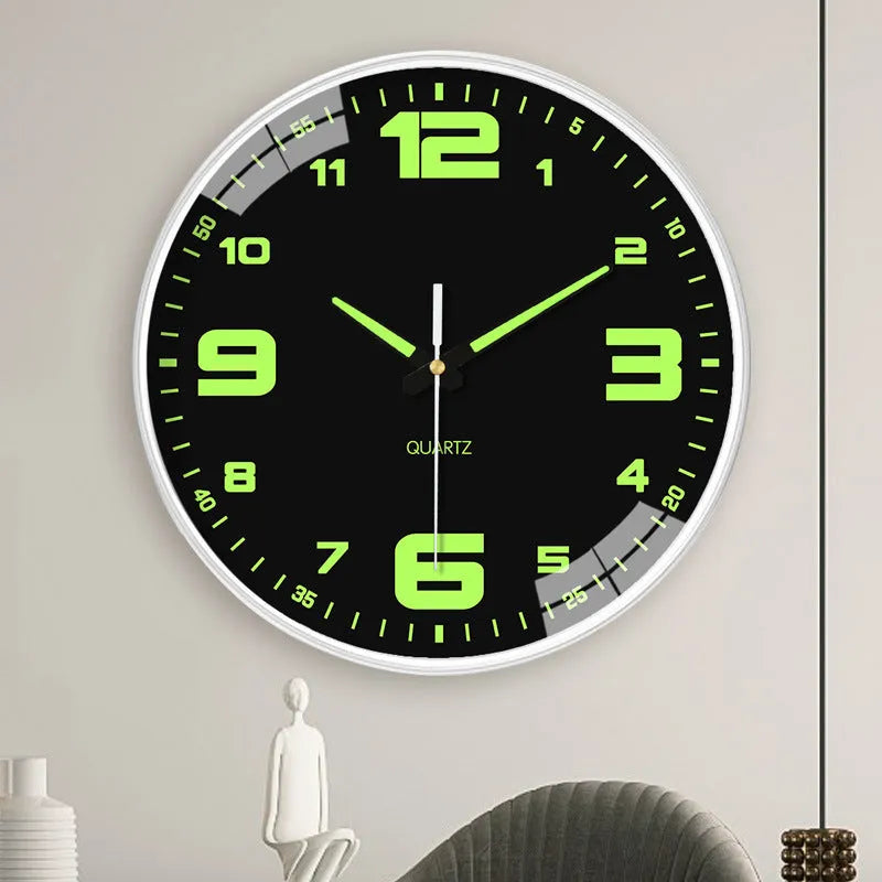8 inch modern wall clock with luminous hands and black numerals on a light dial.