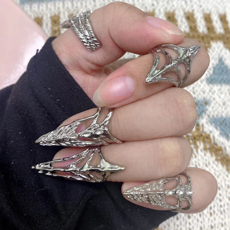 Metal ring with micro inlaid zircon and butterfly geometric design, INS style, on a white background
