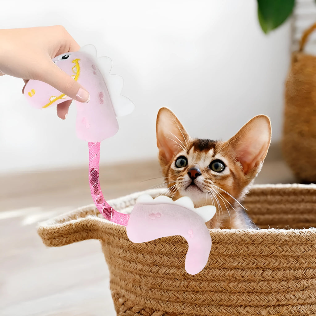Set of four cat toys including rope toy, kicker toys, plush chew toys and cat springs in pink, purple and yellow