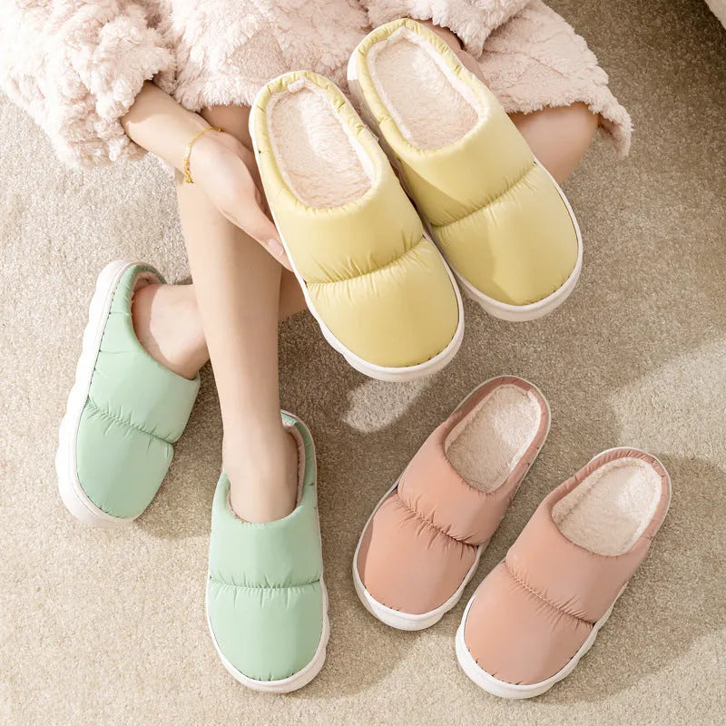 Blue winter house slippers with artificial leather upper, plush lining, and thick rubber anti-slip sole.