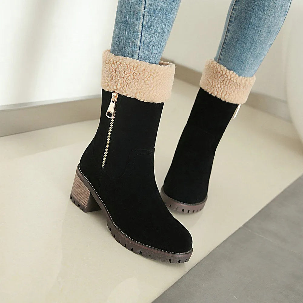 Snow boots with rubber sole and plush lining in black, grey, green, or orange colour options.