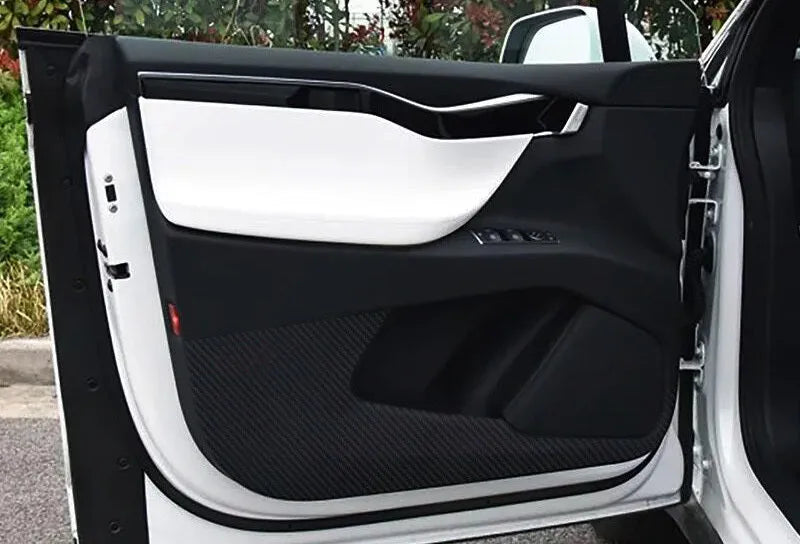 Carbon fibre protective film for Tesla Model S interior door panels showing control layout cutouts