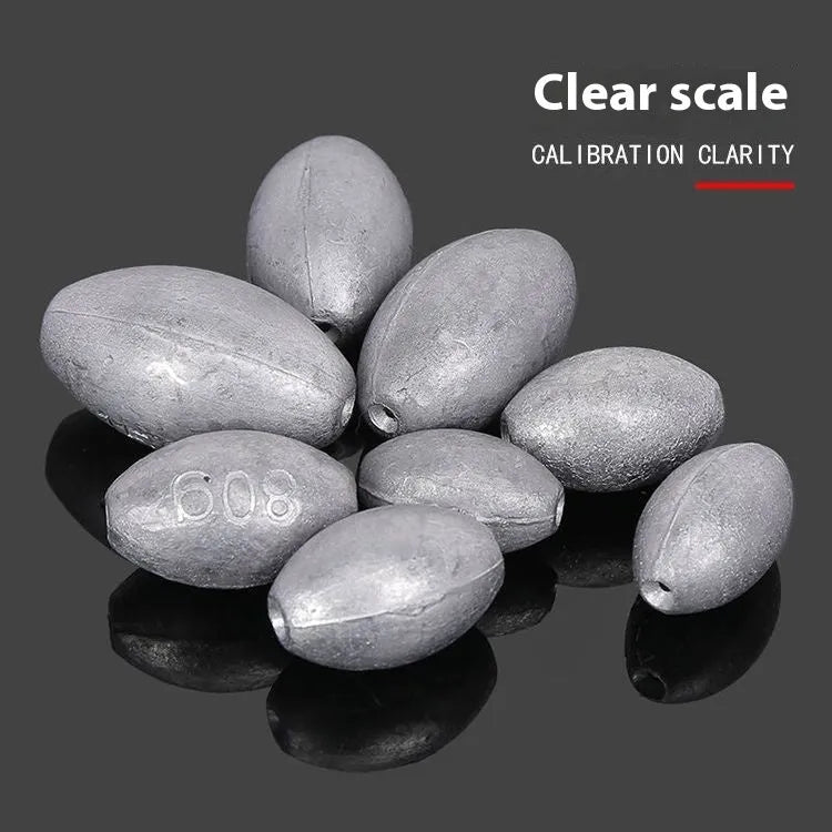 Tongxin rugby-shaped olive fishing pendant sinker with scale and plastic core in various weights.
