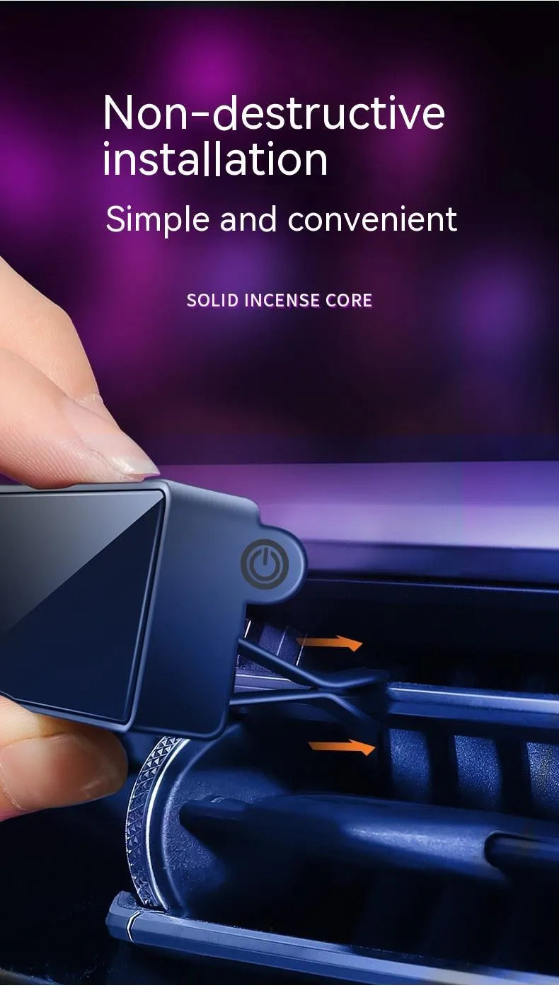 Black automobile air vent clip with LED light and aromatherapy diffuser for car odour removal.