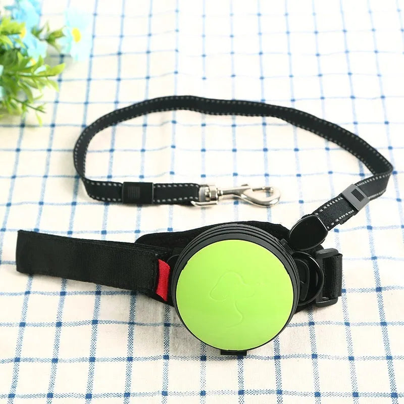 Automatic retractable dog leash extended to 3 metres, shown in vibrant orange colour.
