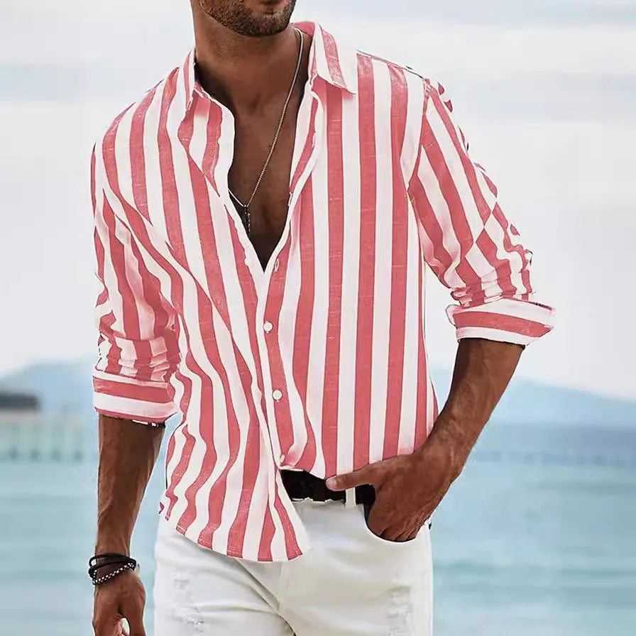 Man wearing a loose grey striped casual long-sleeved shirt with a cardigan style.